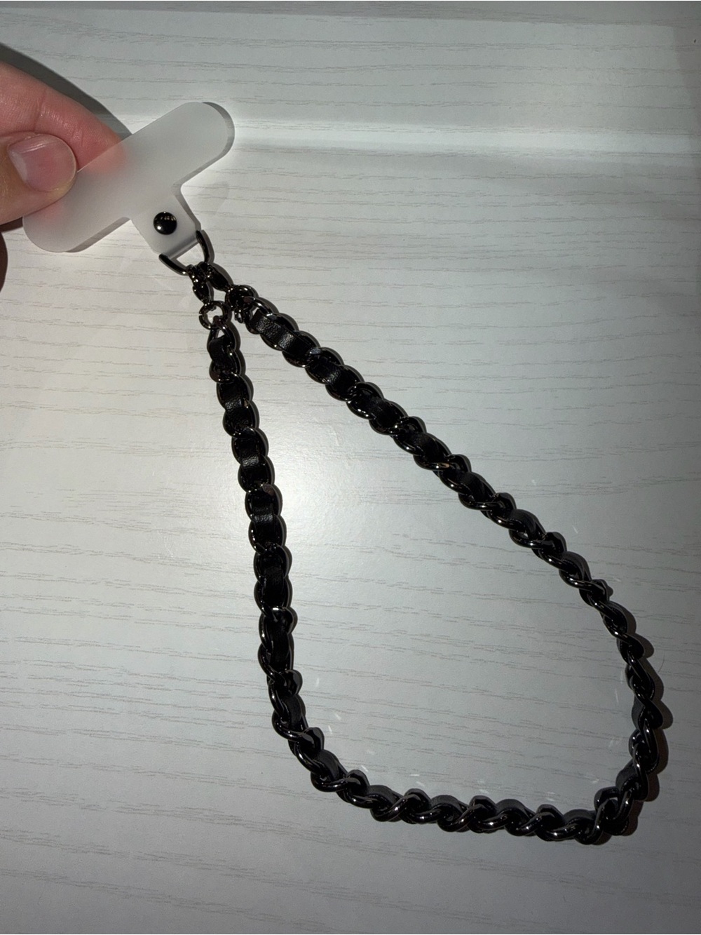 Velvet Caviar Blackout Leather Chain Phone Charm